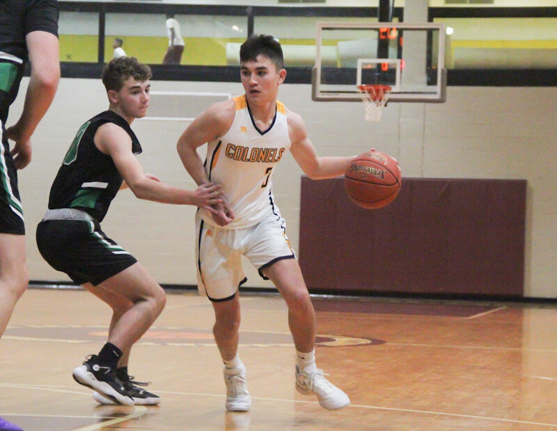 Missouri Military Academy senior Nathan Dempsey maneuvers around a defender in an earlier game this season. Dempsey was named to the Belle all-tournament team last week.