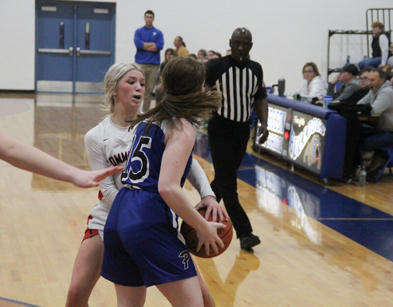 Community R-6 sophomore Peyton Beamer rips the ball away from Paris junior Kennedy Ashenfelter on Wednesday in the girls Sturgeon tournament first round.