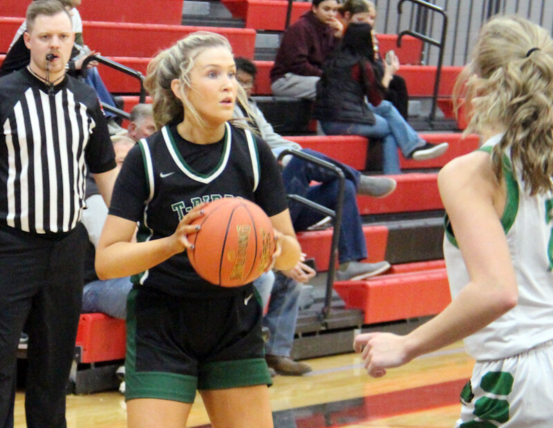 North Callaway senior Riley Blevins surveys the court on Friday against Silex on the Bowling Green tournament. Blevins finished with a triple-double on Monday at Wellsville-Middletown.