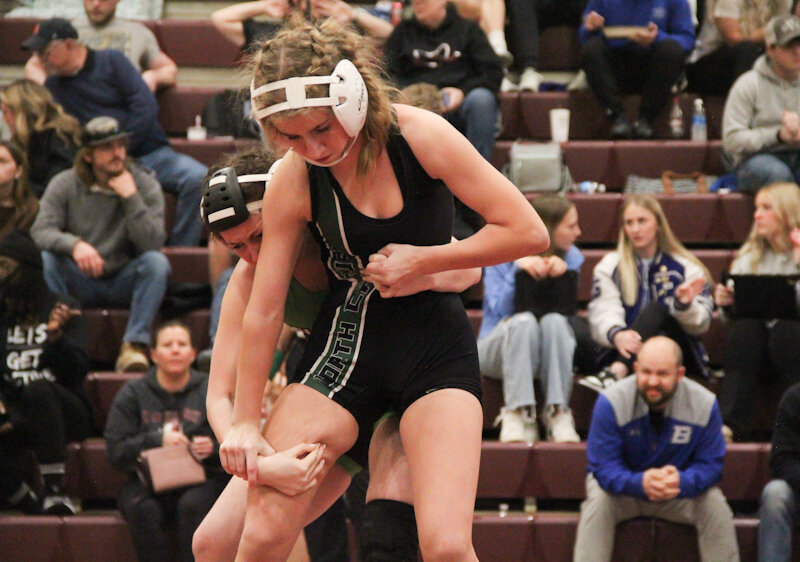 North Callaway sophomore rips off her opponent during districts Saturday at St. Charles West. Giboney became the first state qualifier in North Callaway girls wrestling history.