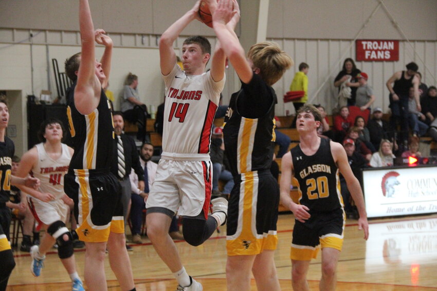 Community R-6 freshman Caden Thomas weaves the Glasgow defense in an earlier game this season. Thomas and the Trojans won in districts on Tuesday night and play state-ranked Higbee tonight.