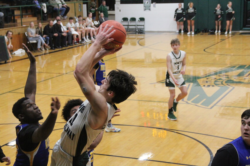 North Callaway senior Sam Pezold fades away while taking a shot over Wright City in an earlier game this season. Pezold's and the Thunderbirds' season ended on Thursday with a loss in districts to Montgomery County.
