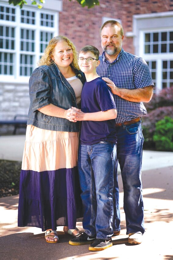Community R-6’s new superintendent Chad Harter is joined by wife, Shannon, and son, David.