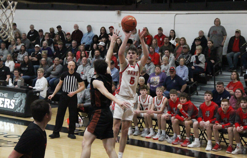 Mexico junior Jaydon Eldridge lobs a shot over Kirksville on Thursday in the Class 4 District 8 semifinals in Centralia. Eldridge led Mexico with 23 points in the Bulldogs' 54-46 victory to advance to today's district title game against the host Panthers at 1 p.m. in Centralia.