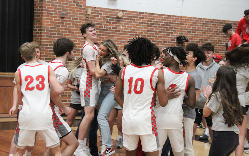 The Mexico Bulldogs celebrate their third district championship in four years on Saturday after a victory over Centralia in the Class 4 District 8 title game in Centralia.