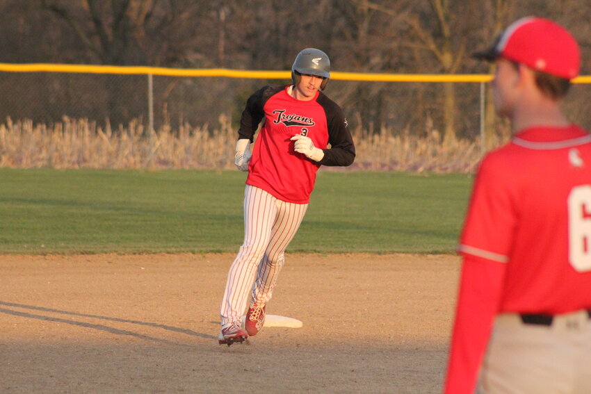 Community R-6 senior Mason Carroll rounds second base after hitting a two-RBI home run in the sixth inning against Marion County on Thursday at home in Laddonia.