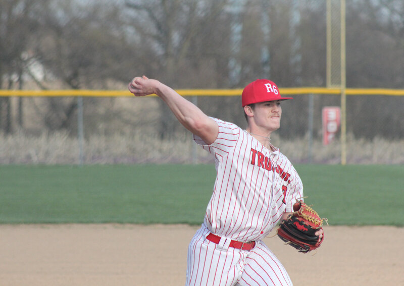 Community R-6 senior Mason Carroll throws a pitch in an earlier game this season. The all-stater pitched the Trojans past Class 6 Ritenour on Saturday.