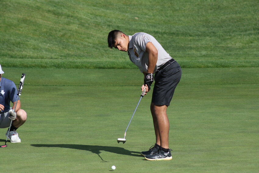Missouri Military Academy sophomore Carlos Ontiveros putts on April 16 during a Fulton quad at Tanglewood Golf Course.