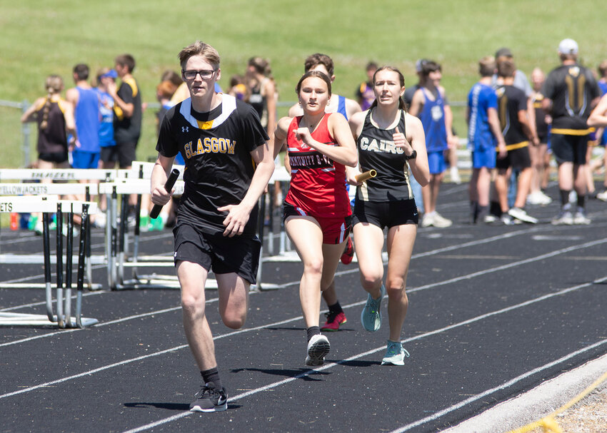 Community R-6 freshman Lydia Hoyt makes a move in the 4x800 to pass a runner from Cairo at the Central Activities Conference meet in Glasgow. The team, consisting of Peyton Schafer, Alyssa Beamer, Hoyt, and Kat Meyer earned first place honors and set a new school record.