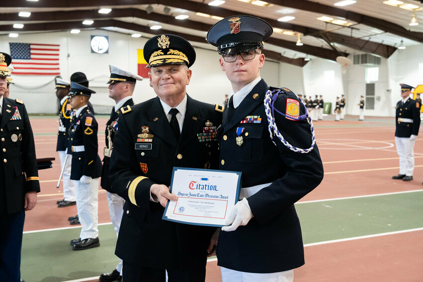 Missouri Military Academy President Brigadier General Richard V. Geraci presented Cadet Eric Shellabarger with the JROTC Cybersecurity Superior Cadet award on Saturday, April 20.