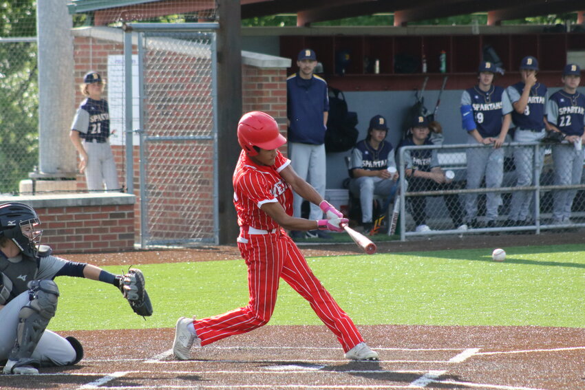 Mexico senior Ashton Belcher swings at a pitch on Friday at home against Battle. Belcher had the walk-off two-RBI double in the sixth inning for an 11-0 victory.