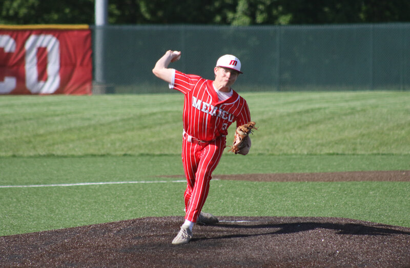 Mexico junior Sam Ryan pitches in the Bulldogs' regular season finale against Battle this season. Ryan was outpitched by Father Tolton's Sam Ryan in a 1-0 loss Tuesday in districts.
