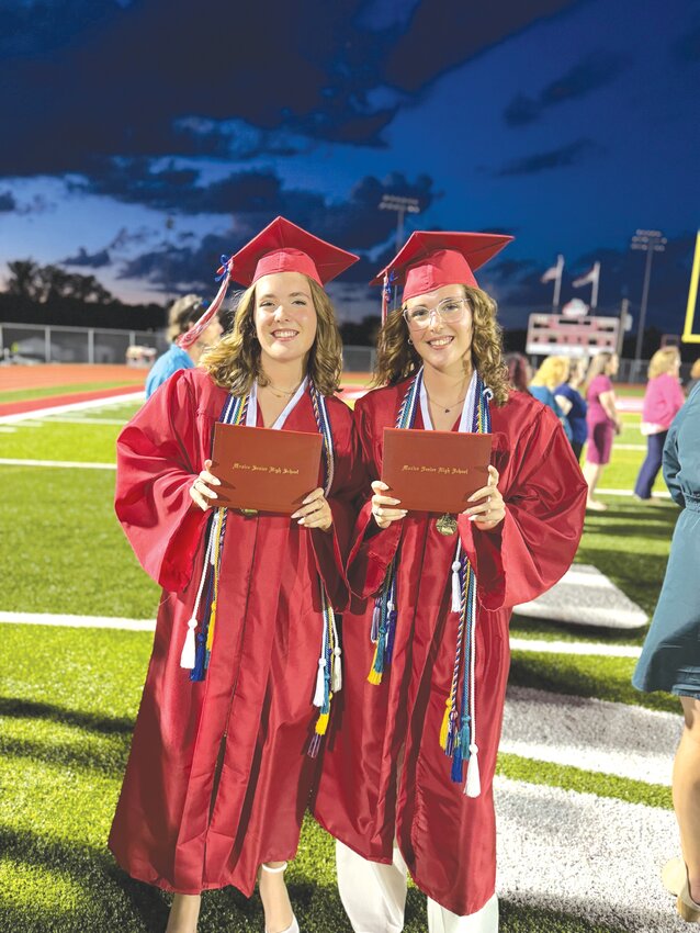 Mexico High School hosted its 2024 commencement at 7:30 p.m. Friday, May 17 at the football field as MHS graduates closed one chapter while opening the next. Here, salutatorian Anna Raines, left, and valedictorian Ella Raines show off their newly acquired diplomas.