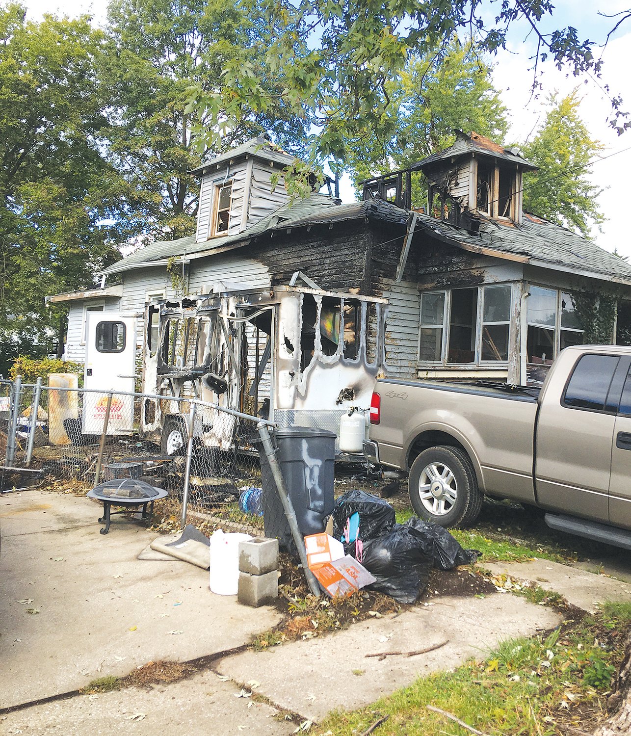 A Saturday afternoon fire claimed a food truck trailer and damaged nearby homes in Mexico. No one was injured. [Nathan Lilley photo]