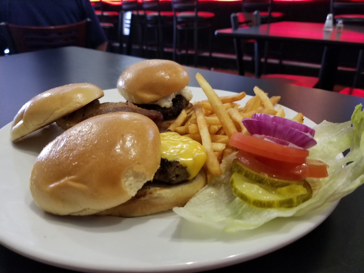 A trio of sliders at The 581 offer big flavor in a small package. [Dave Faries]