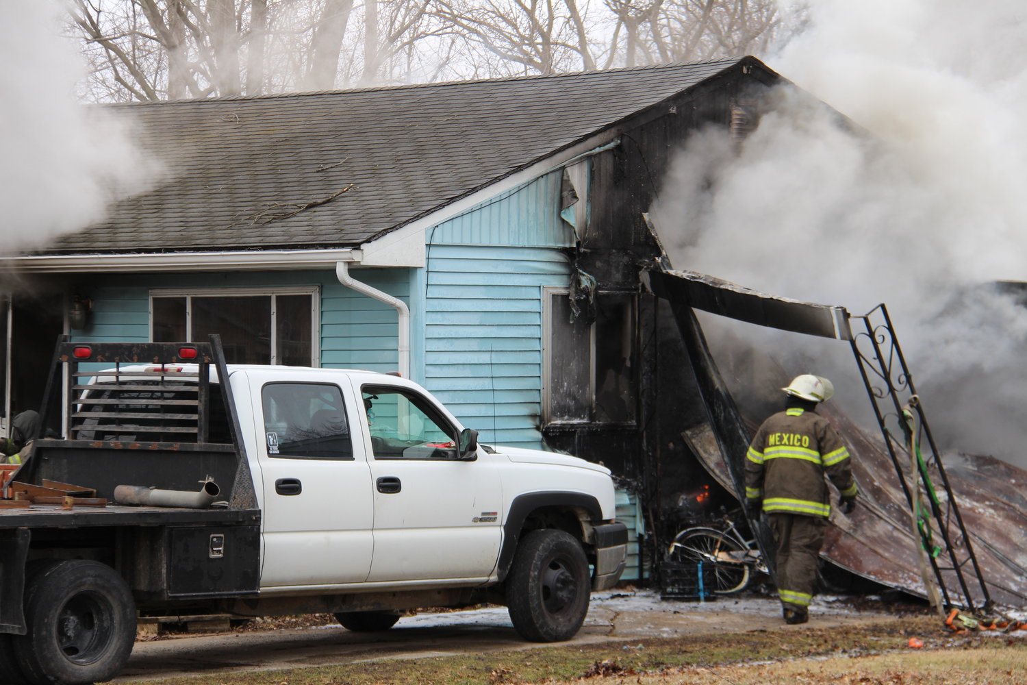 The home’s carport sustained significant damage, where the fire may have started. [Nathan Lilley Photo]