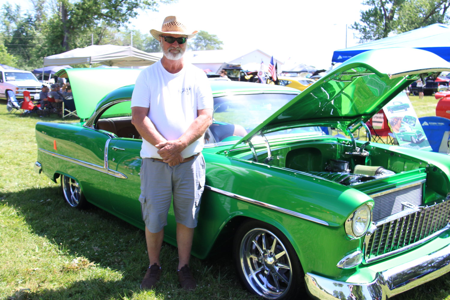 Ron Welch stands proudly with a car that had plenty left green with envy at Saturday's Graf & Sons Car Show at the Mexico Elks Lodge. [Photo by Alan Dale]