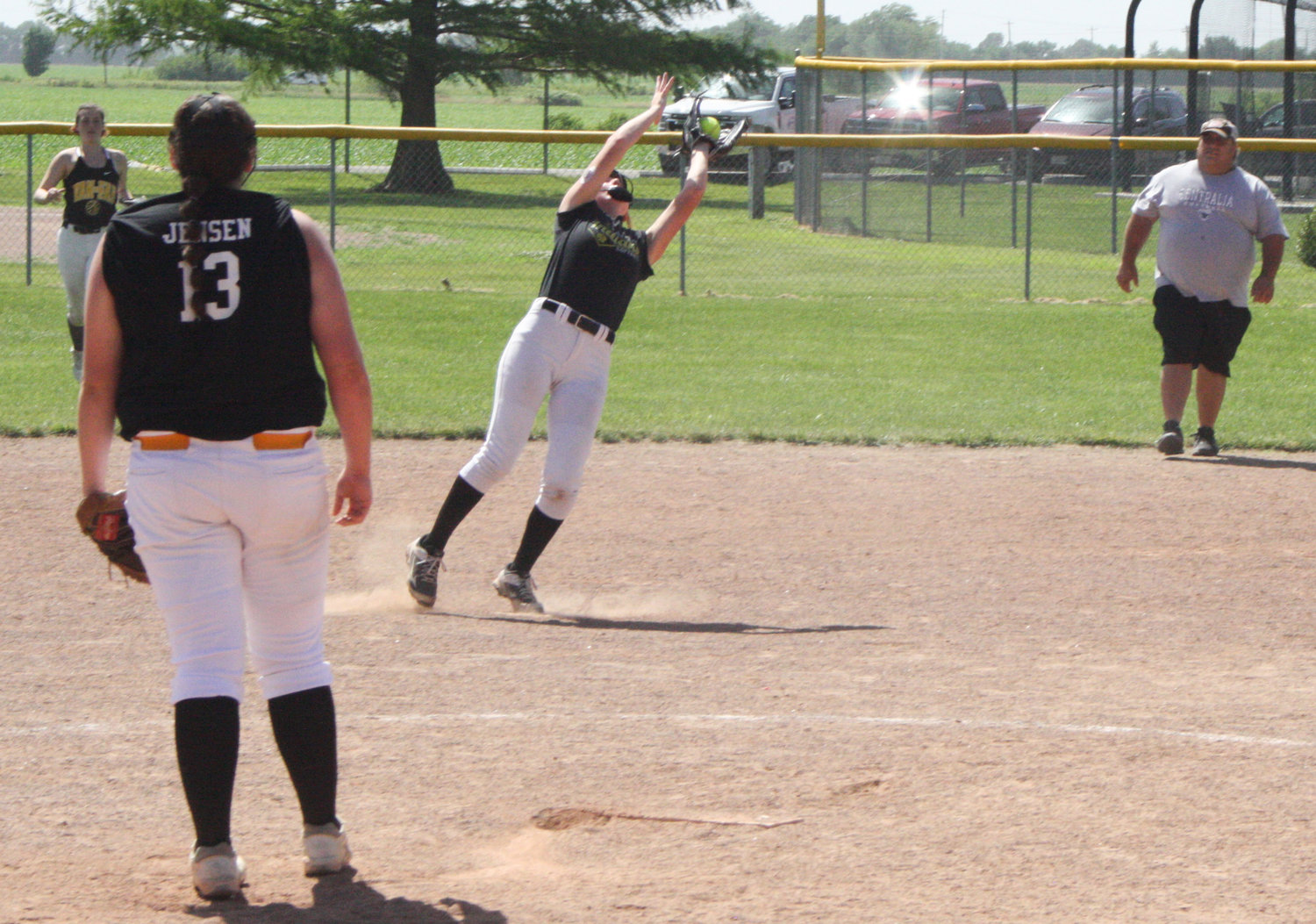 Van-Far's Madelyn Caldwell reaches out June 14 for a catch in a summer league game the Lady Indians played in Centralia.