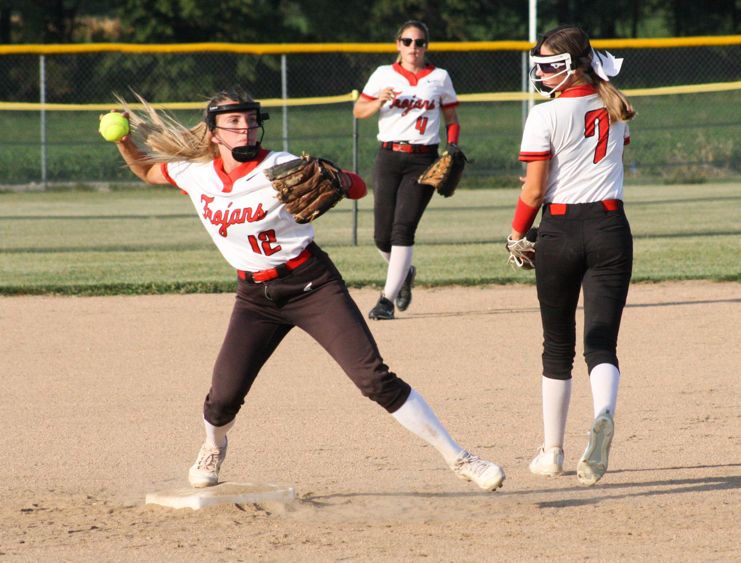 Community R-6 senior shortstop Sarah Angel makes a play in an earlier home game this season against Paris. The Lady Trojans recognized their seniors Thursday for senior night and defeated conference foe Madison 14-2 in five innings.