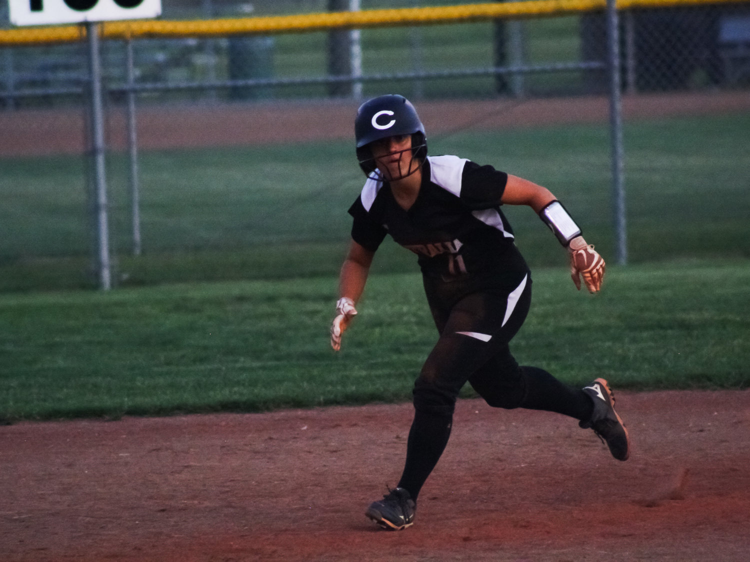 Centralia junior third baseman Ellie Page takes a lead off second base in a Sept. 13 home game against Mexico. Page finished with four hits Thursday in a 16-1 win at Clarence Cannon Conference foe Clark County.