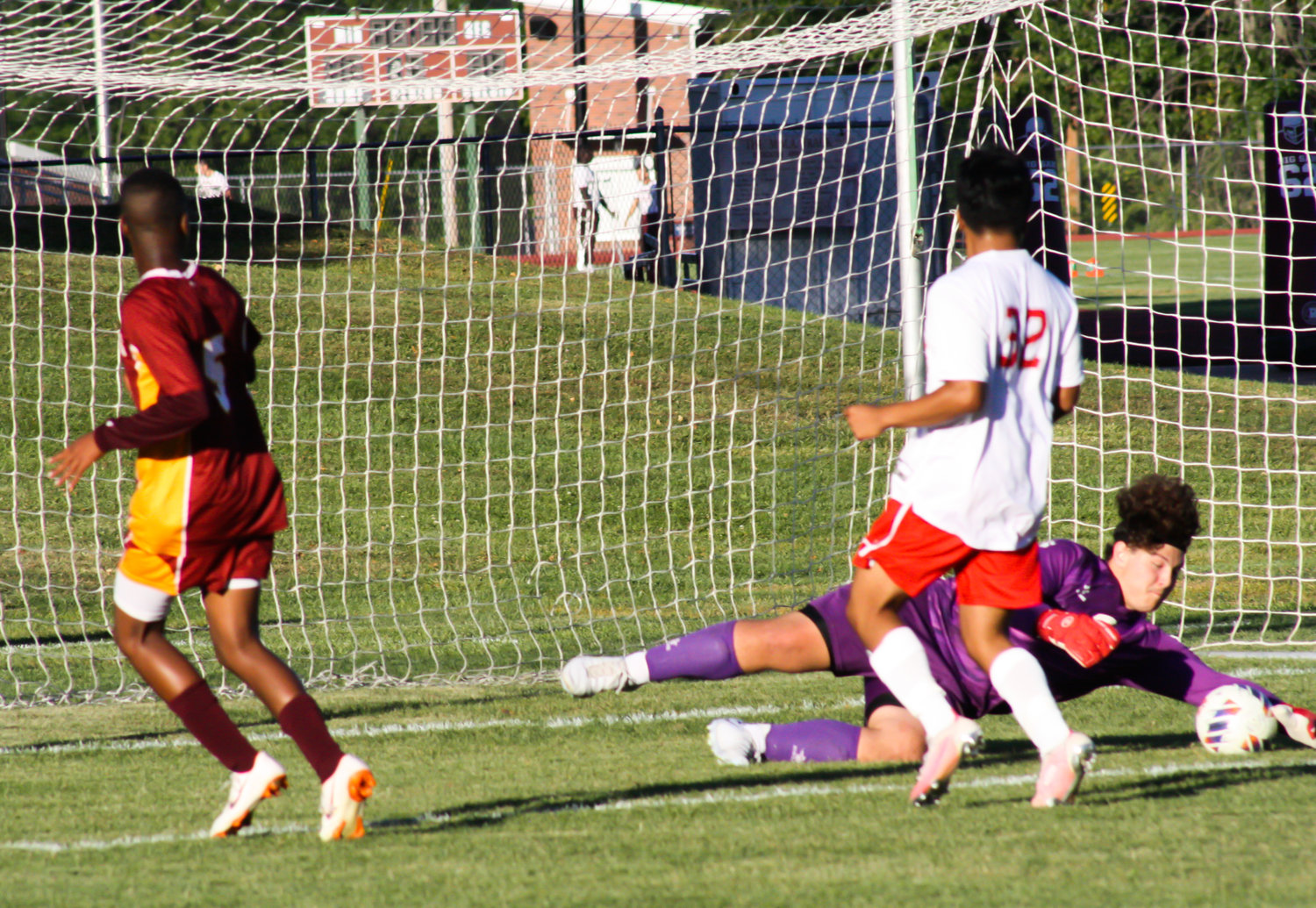 Mexico junior goalkeeper stops Missouri Military Academy senior midfielder Kellan Mugisha's shot in the first half of MMA's 3-1 victory between the crosstown teams. Scanavino made 12 saves but allowed a goal to Mugisha and two to Gorka Yarte.