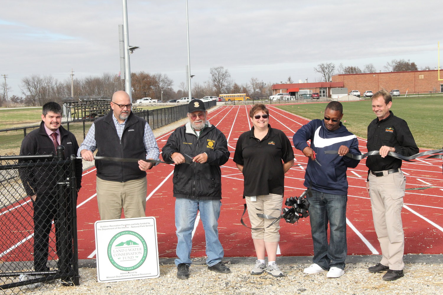 Van-Far's school board members cut the ribbon Tuesday to dedicate the district's new all-weather track in Vandalia. The project was approved in November 2021 and was constructed this year.