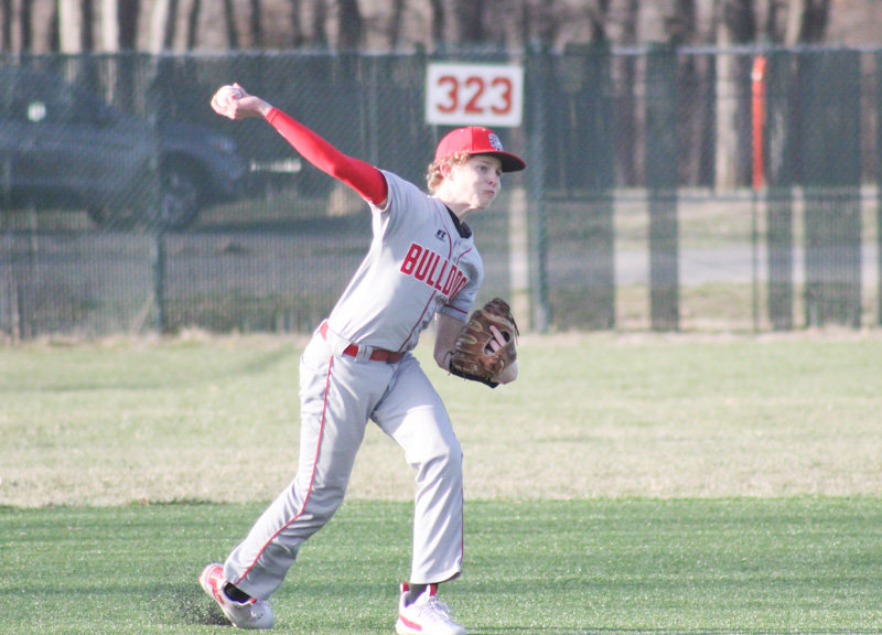 Mexico sophomore Sam Ryan makes a throw from third base on Monday at home against Moberly.