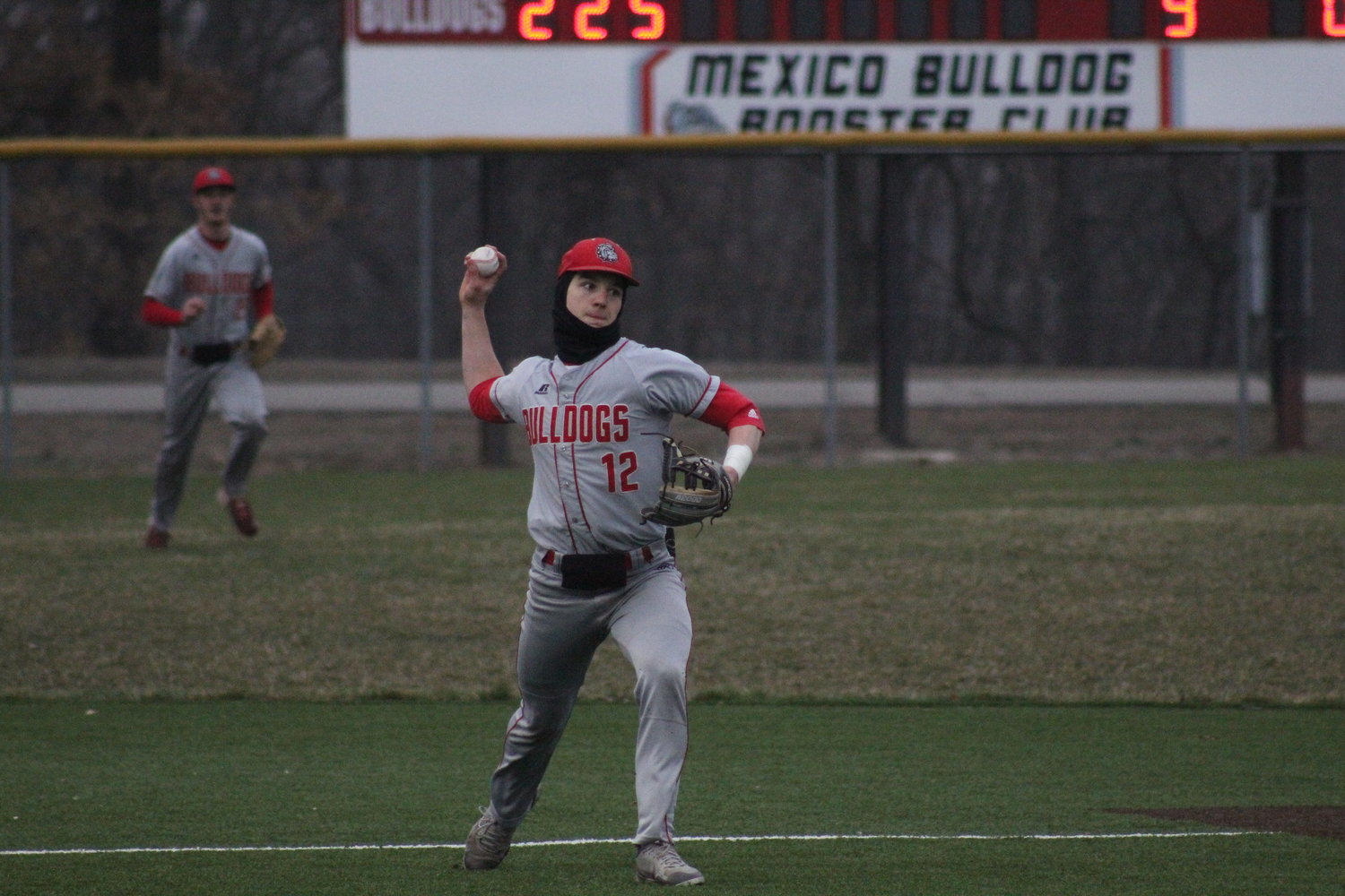 Mexico senior Andrew Runge makes a throw to record an out against Marshall on Thursday at home. Runge finished with two hits and an RBI in the victory.