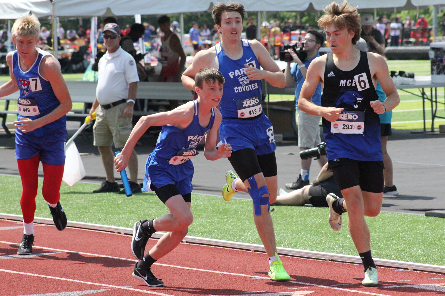 Paris freshman Landen Chapman takes the baton from senior Brayden DeOrnellas in the 4x800-meter relay on Saturday in the Class 1 state meet. DeOrnellas, Chapman and seniors Clayton Duncan and Drew Williams finished sixth to be all-state.