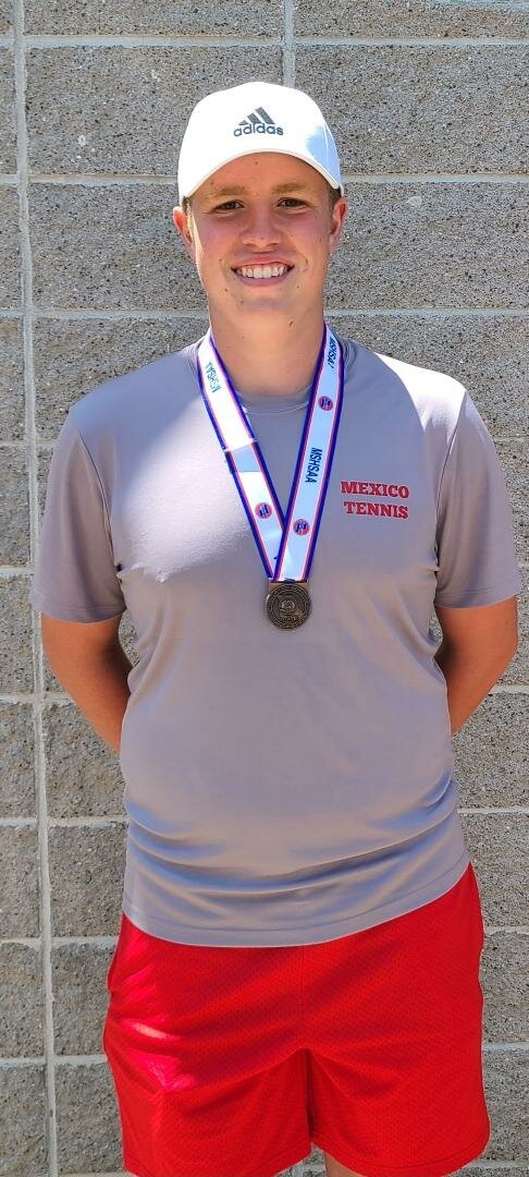 Mexico junior Brendan McKeown stands proud while adorned with his state medal on Saturday at the Class 1 singles tournament in Springfield. McKeown finished seventh to earn the medal.