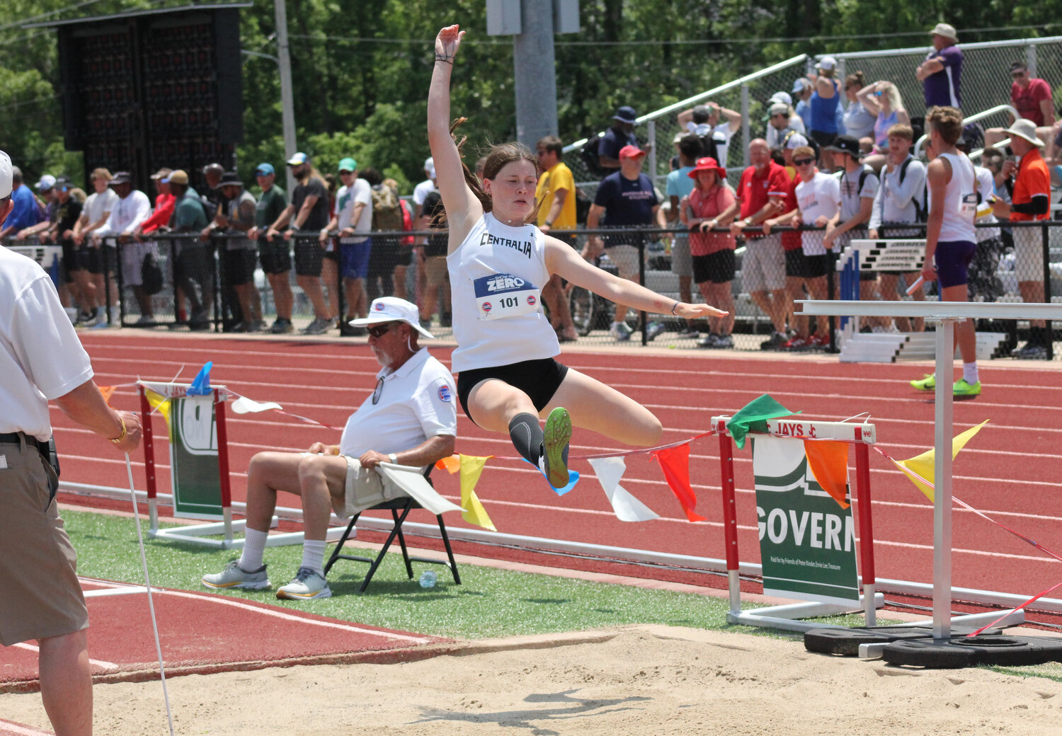 Centralia senior Autumn Hawkins glides through the air on her school-record-breaking long jump on Saturday in the Class 3 state track and field meet.