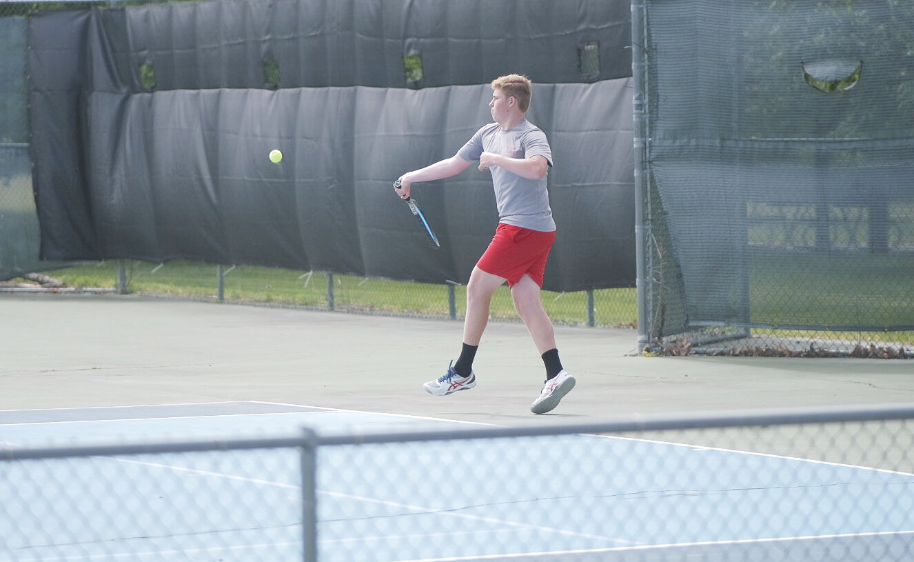 Mexico's Brendan McKeown returns a ball to his sectional opponent in the round before the state tournament. McKeown endured a more than two hour match at Cosmo Park in Columbia last month against Kirksville's Gavin Pike to earn the highly coveted spot at state.
