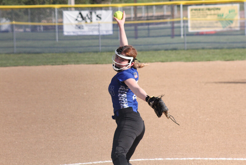Paris junior Kennedy Ashenfelter pitches against Community R-6 on Wednesday at home.
