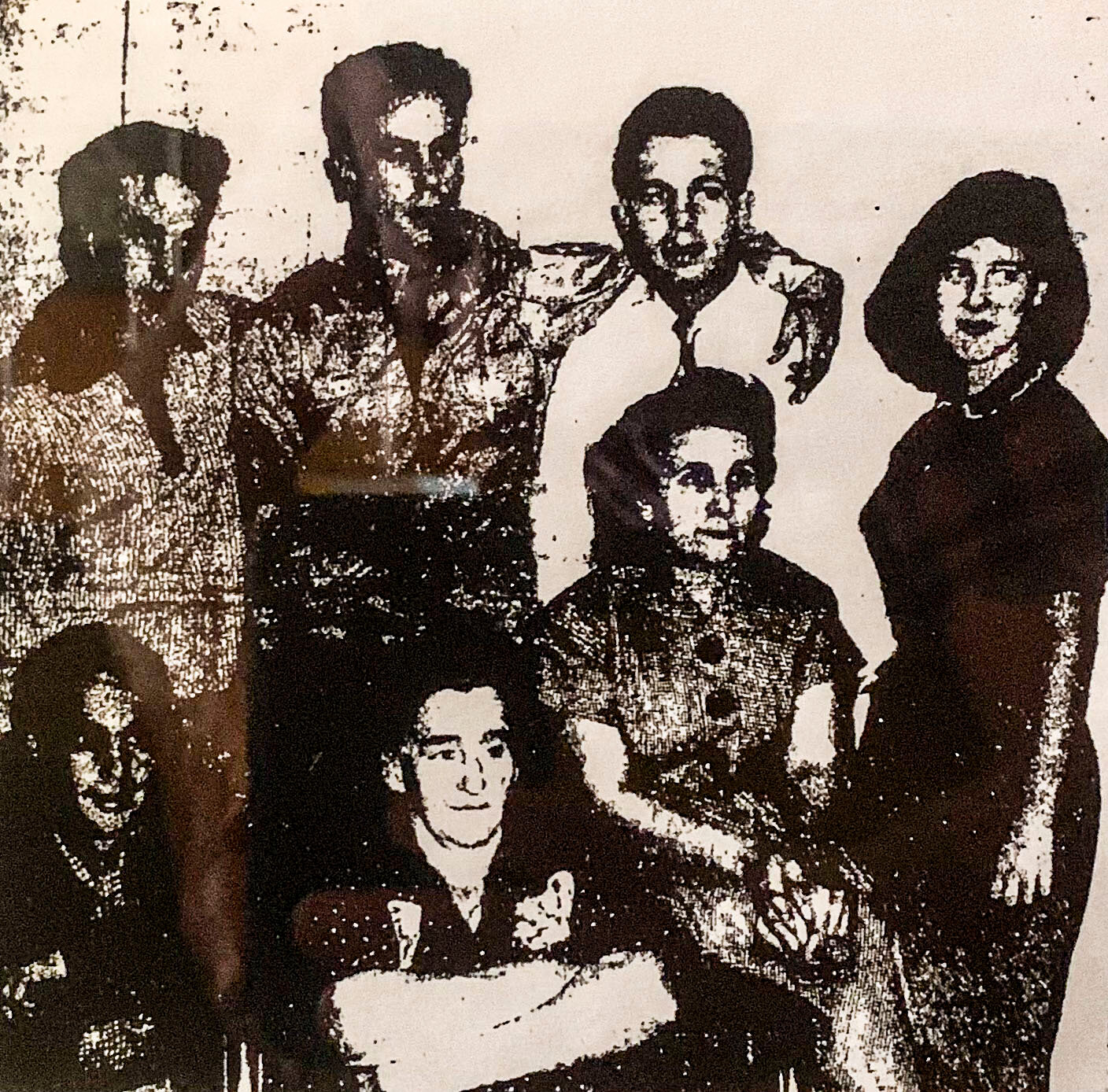 A photo in the Ledger of a reunited family included standing from left is his siblings Ralph, Moss, Paul and Marliyn and seated Ralph, Martha Shoemaker (grandmother), and Mary Jesse (Moss’ mother).