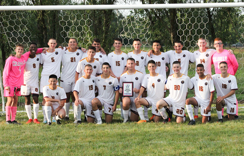 Missouri Military Academy soccer celebrates winning first place in the blue division of the Moberly Invitational on Saturday.