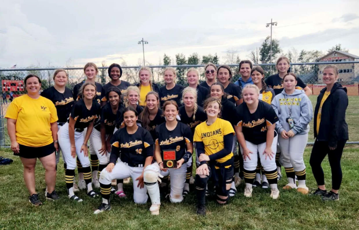 Van-Far softball celebrates after finishing third on Saturday at the North Shelby Tournament, winning its first two games of the season in the process.