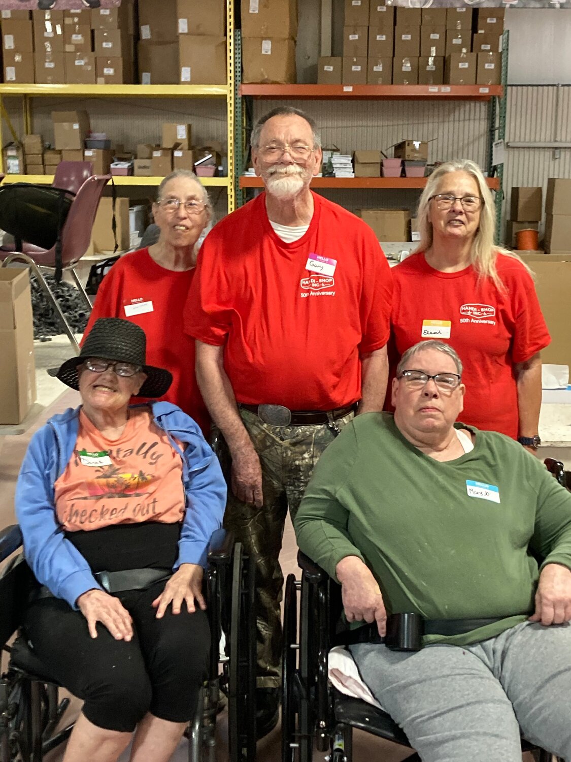 The original “Fab Five” employees at the Handi Shop got together for a photo at the 50th anniversary celebration. From left standing: May Trams, Gary Brewer, and Elly Chrismer. Sitting is Donna Davis, left, and Mary Jo Lierheimer, right. Trams, Brewer, and Chrismer all still work at the shop.