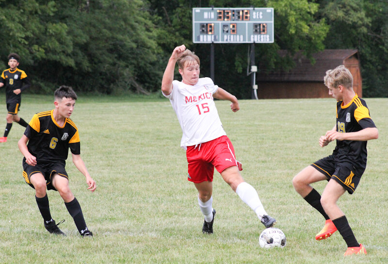 Mexico junior Gage Walker tries to gain possession of the ball this season.