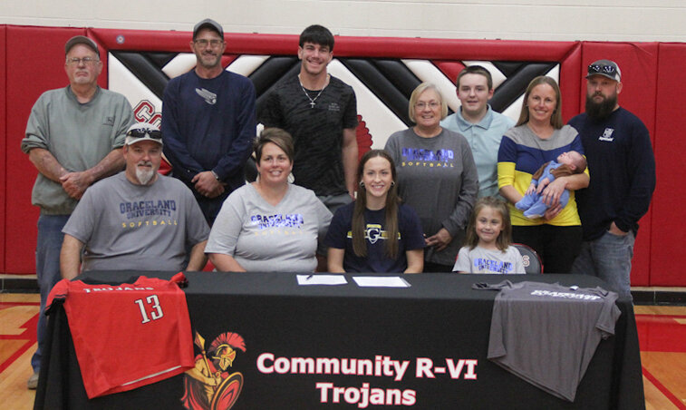 Community R-6 senior Brooklynn Glasgow gathered with family on Wednesday at Community R-6 High School in Laddonia for her signing ceremony to play softball at Graceland University in Lamoni, Iowa.