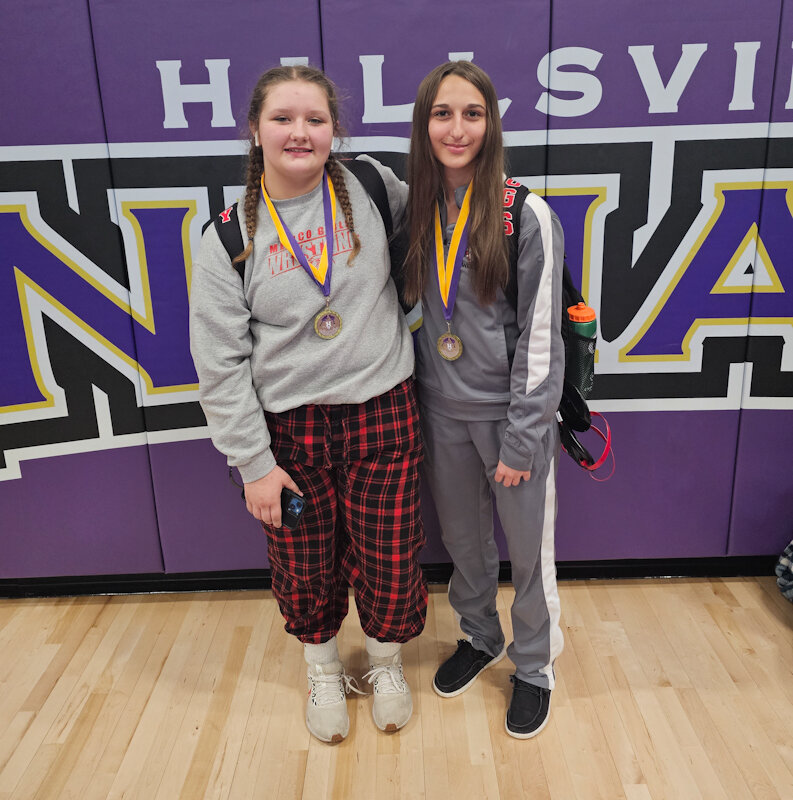 Mexico sophomore Alexus Johns (left) and freshman Lilly Debo took home medals from the Hallsville Indians' Girls Classic on Monday.