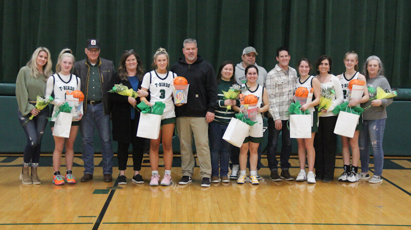 The North Callaway Ladybird seniors stand with their families before Monday's Senior Night game against Wright City in Kingdom City.