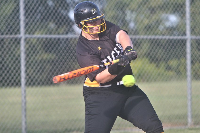Wellsville-Middletown junior Meagan Cripe swings at a pitch against Louisiana on Sept. 15. She had three hits and two runs scored in the Tigers' 16-5 win over Marion County on Sept. 12 that snapped a 52-game losing streak.
