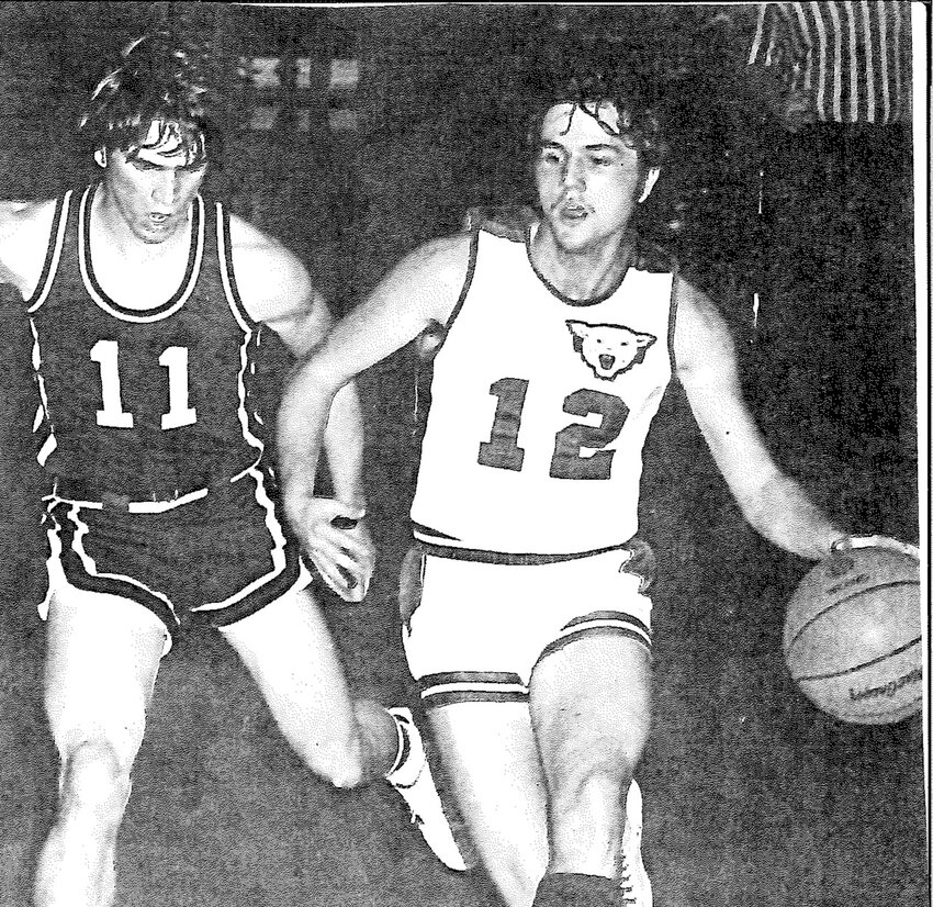 Chuck Clark dribbles the ball up the court in a game against Louisiana in the 1973-74 season. Clark helped the Montgomery County boys basketball team finish third in the state tournament.