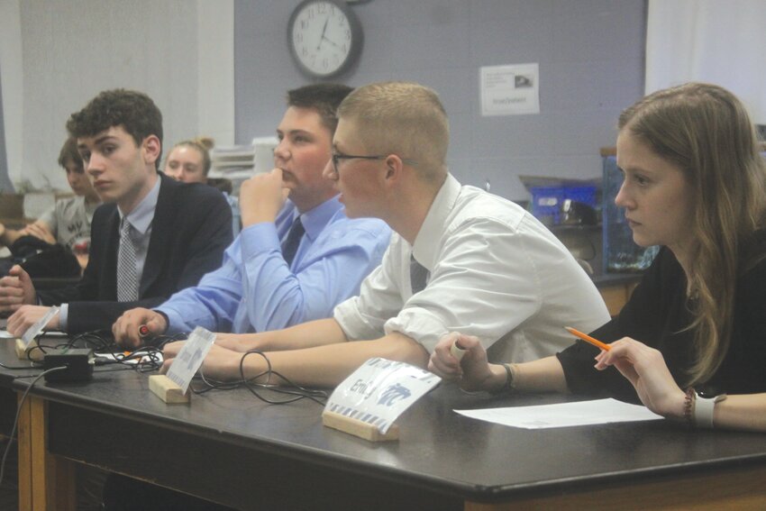 Beckham Cothren, Landon Pottebaum, Bryson Nichols and Emily Clark of Montgomery County figure out a question during a round-robin match with Clopton at the Eastern Missouri Conference Scholar Bowl on March 5 at Bowling Green High School. MCHS was eliminated in the semifinals of the 11-team tournament.