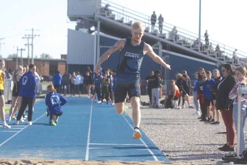 Montgomery County junior Tyler Erwin competes in the triple jump at the Montgomery County Invite on March 19. Erwin is one of three returning all-state medalists for the Wildcats.