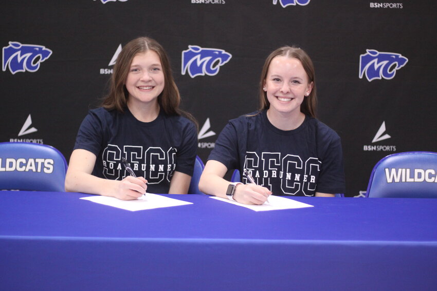 Montgomery County senior Malia Rodgers and Wellsville-Middletown senior Bethany Slovensky sign their letters of intent on March 28 at MCHS to compete in basketball and track at State Fair Community College for the 2024-2025 school year.