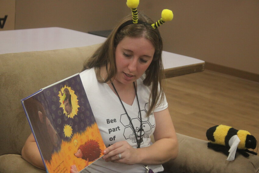 Katie Bainbridge of the Montgomery City Public Library reads a book to the children during last year’s Summer Reading Program.
