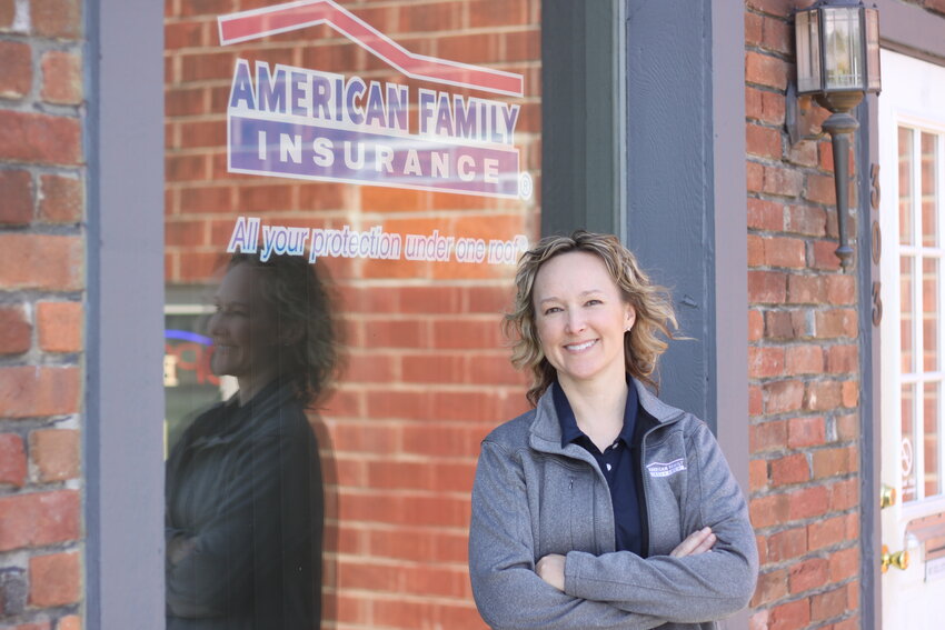 Montgomery City resident Sara Johnson poses at the front of the American Family Insurance building at 303 N. Sturgeon Street in Montgomery City. She was appointed as the new insurance agent on April 15.