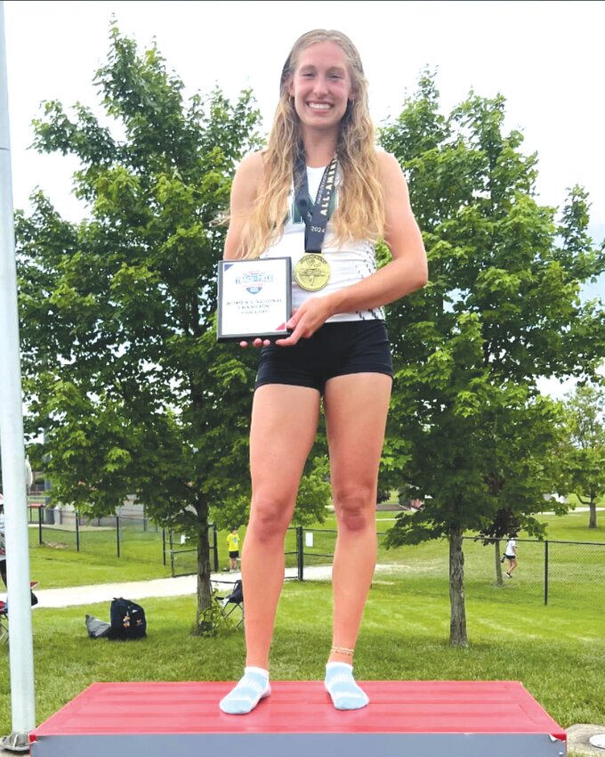 Central Methodist University junior and Montgomery County graduate Renee Finke poses with her national championship award in the high jump on May 25 at the NAIA Outdoor Nationals in Marion, Ind.