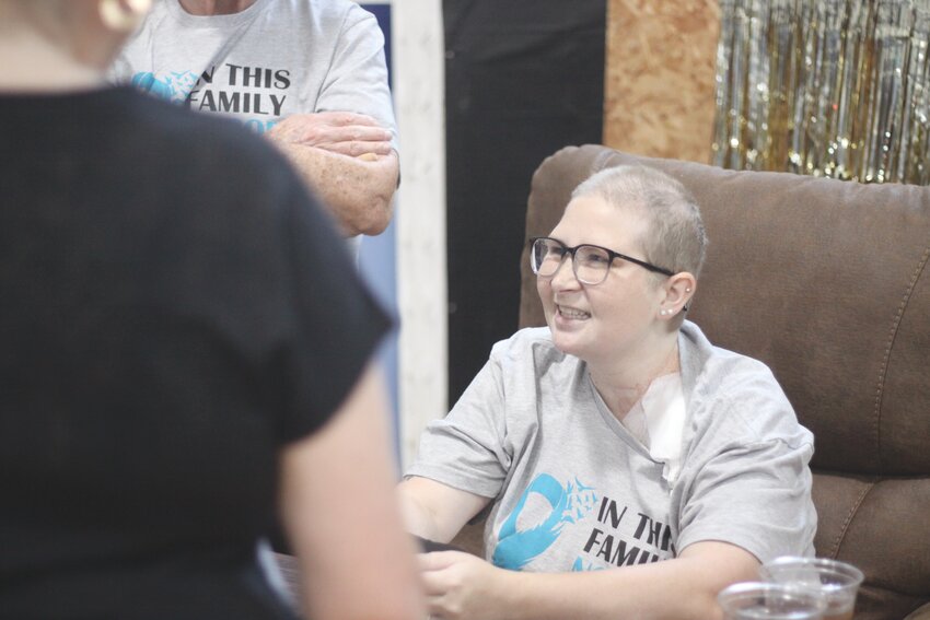 Montgomery City resident Mackenzie Hagemeier talks with some people during her fundraiser benefit on July 13 at the Knights of Columbus Hall in Montgomery City. Hagemeier has been battling cancer since 2019.